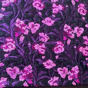 Sequined and embroidered lace fabric